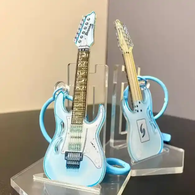 simple-and-elegant-small-guitar-instrume-var4-1789514651998-585 Simple And Elegant, Small Guitar Instrument, Acrylic Keychain, Schoolbag Pendant, Decorative Móc Treo Đeo Thoại, Standee, Móc Khoá In Theo Yêu Cầu, Chất Liệu Mica Dày 4mm, Kích Thước 5.5 Cm, Có In Test Mẫu